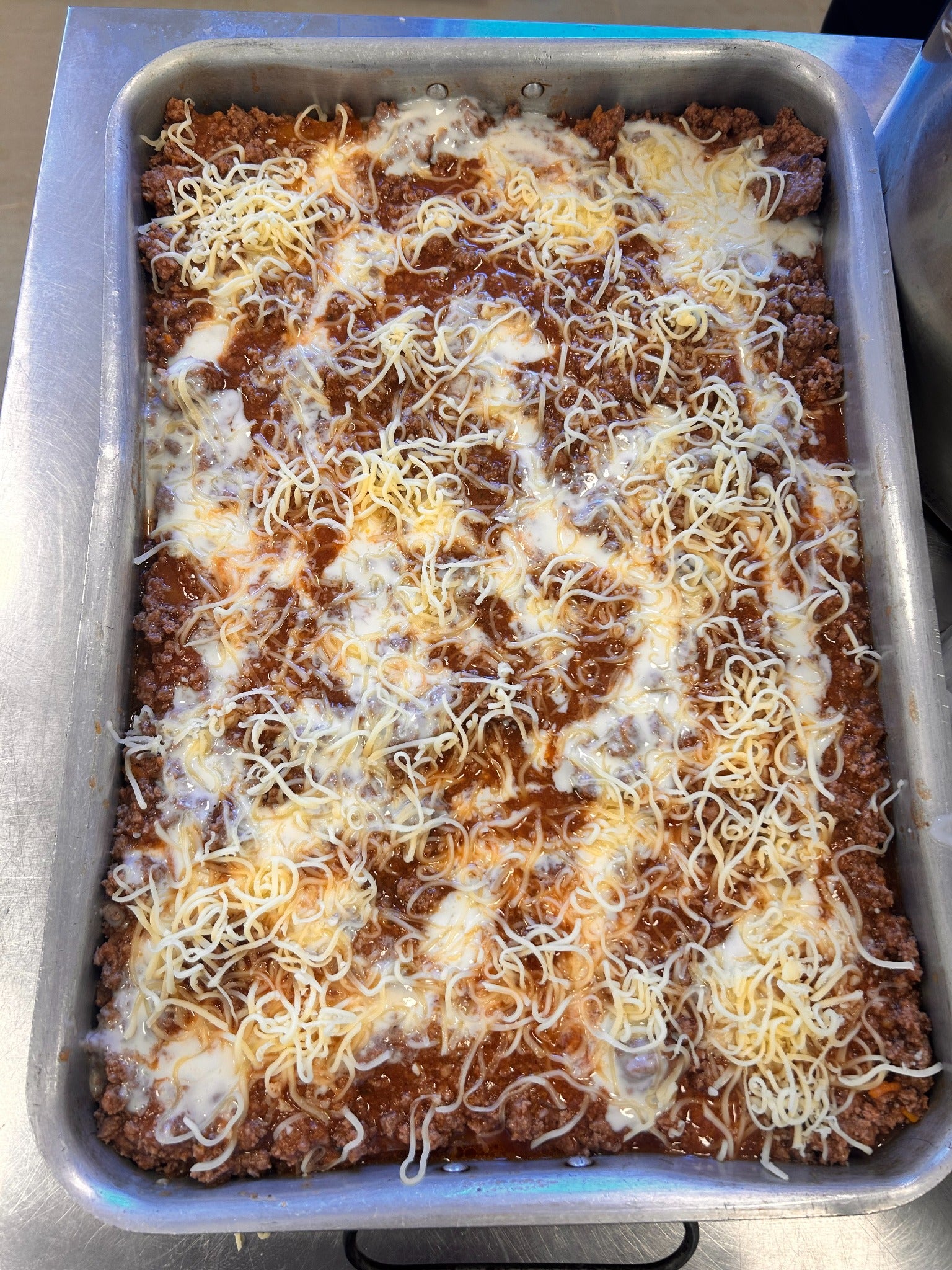 Preparación casera con carne y queso